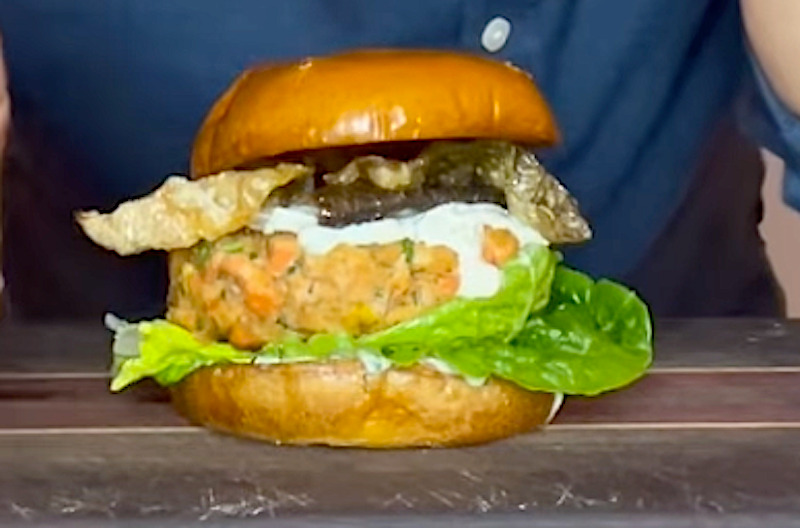 Salmon burger with fresh sockeye salmon, tartar sauce and salmon skin chicharrones