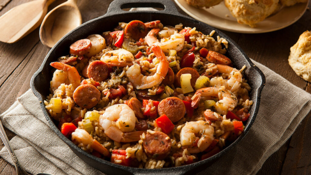 Cast iron pan full of jambalaya.