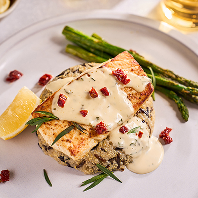 Easter fish recipes with a plate of broiled halibut topped with sauce